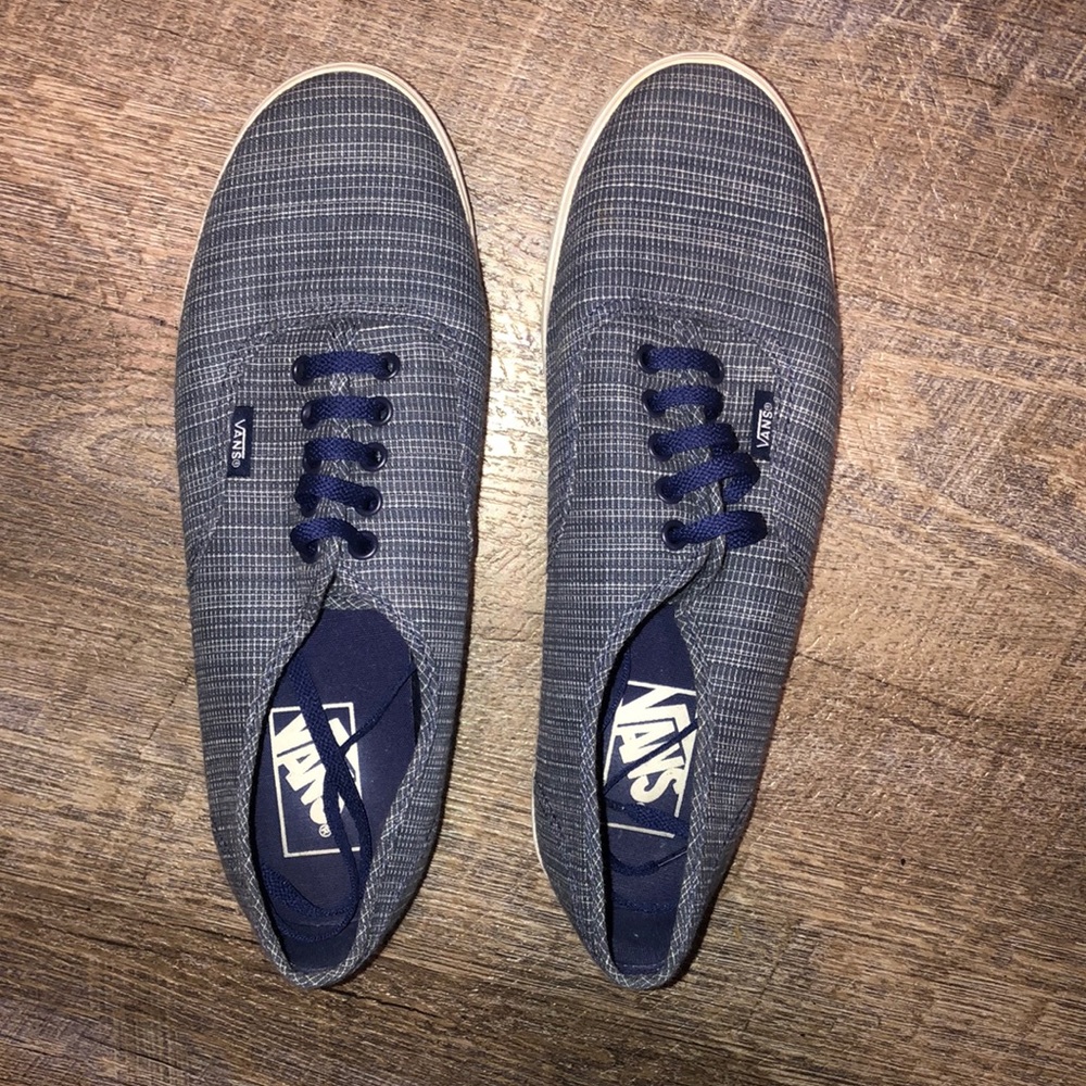 Navy blue and white Vans